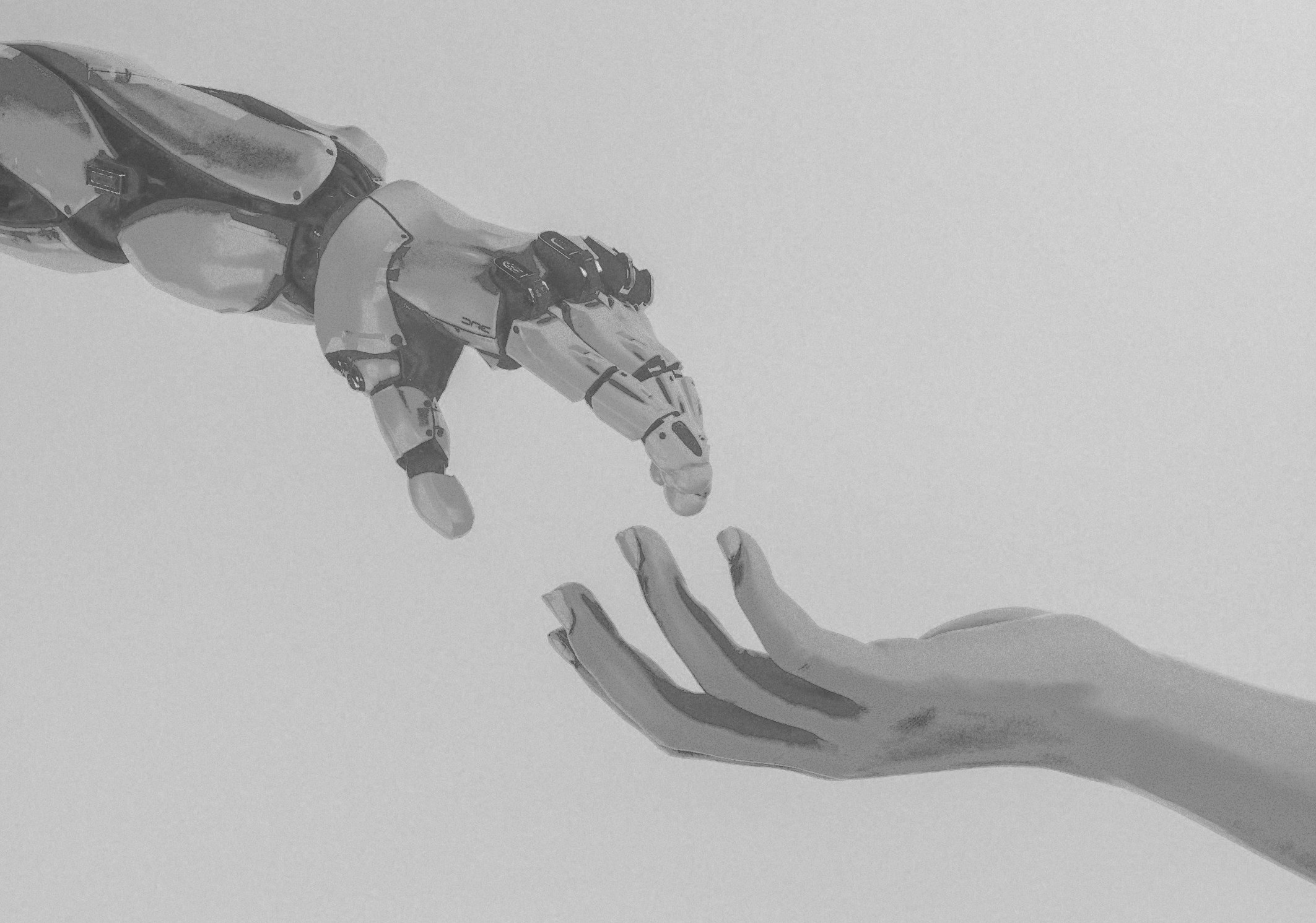 Un mano robotica che incontra una mano umana